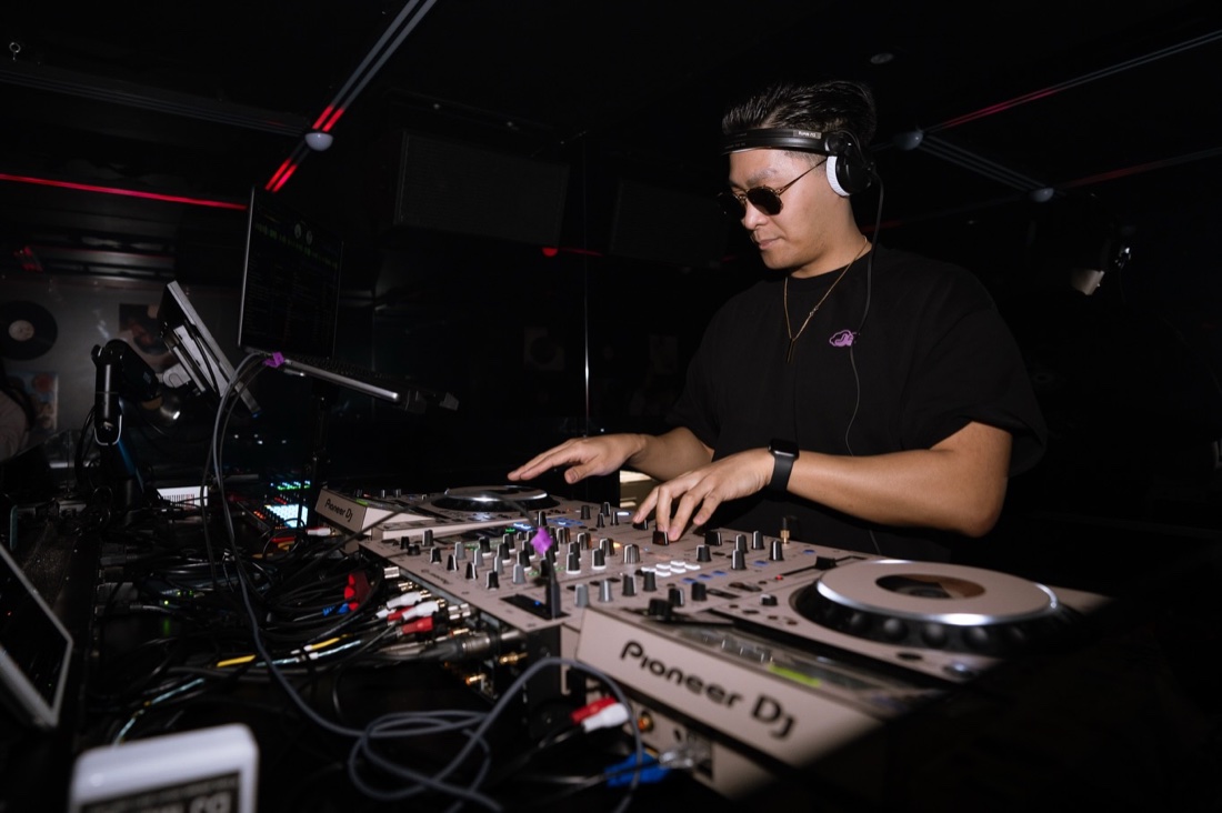 DJ on the decks at *82 party